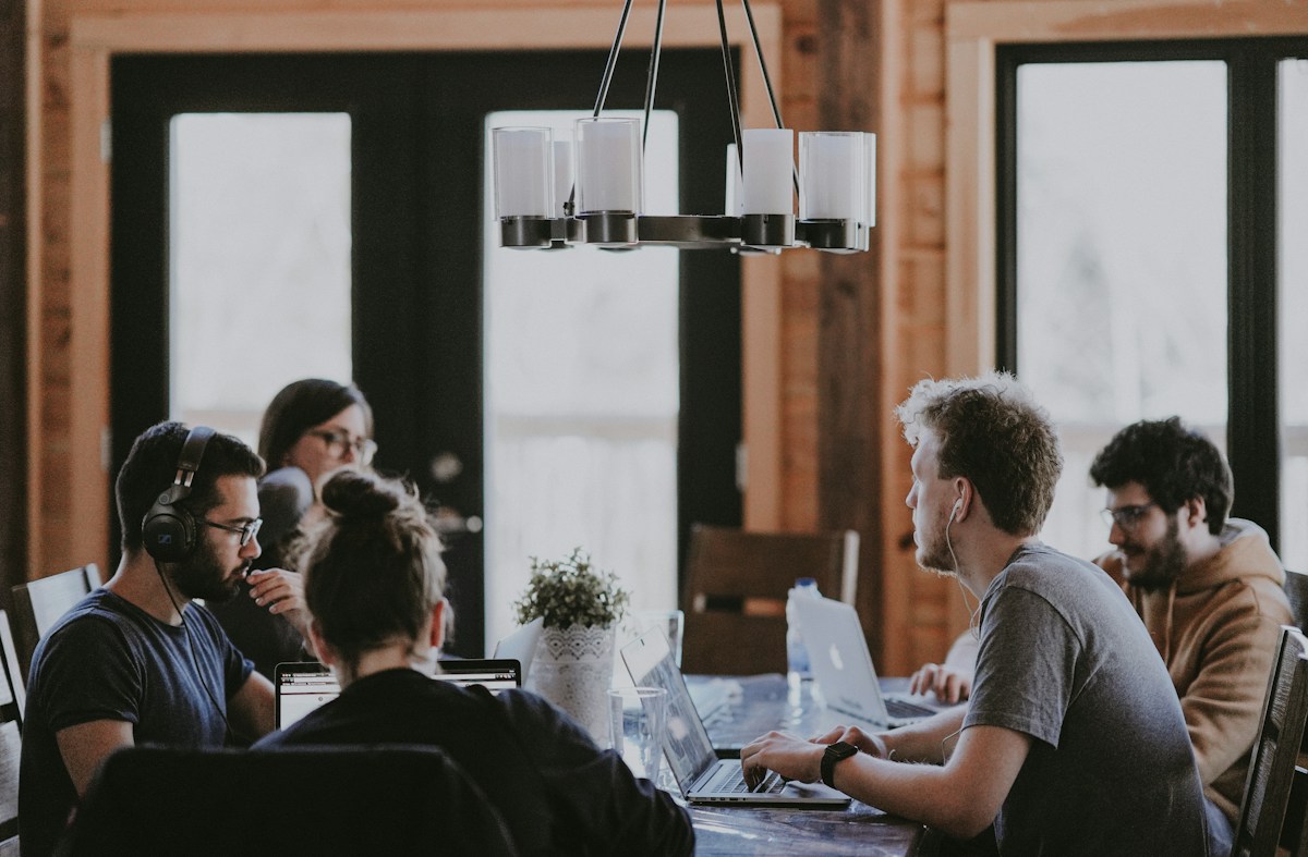 Professionals working together around a shared table